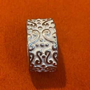 Beautiful handcrafted Silvertone artisan ring band